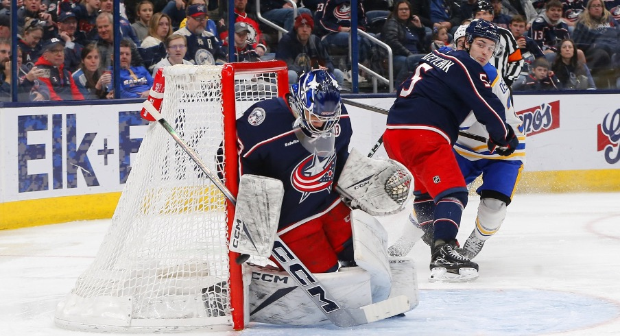 Columbus Blue Jackets goalie Jet Greaves (73) makes a blocker save against the Buffalo Sabres during the third period at Nationwide Arena.