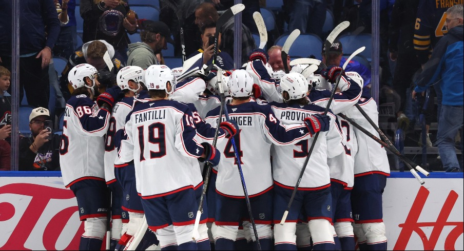 Miles Wood returned to the lineup and scored two goals Tuesday night, including the overtime winner, in the Blue Jackets' 4-3 win over the Buffalo Sabres.