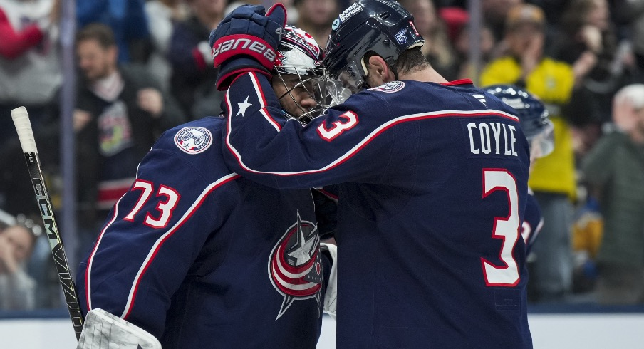 Nov 1, 2025; Columbus, Ohio, USA; Columbus Blue Jackets goaltender Jet Greaves (73) celebrates with center Charlie Coyle (3) after defeating the St. Louis Blues at Nationwide Arena.