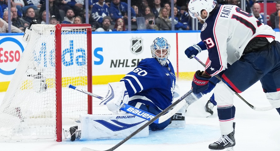 Nov 20, 2025; Toronto, Ontario, CAN; Columbus Blue Jackets center Adam Fantilli (19) scores the winning goal against the Toronto Maple Leafs during the overtime period at Scotiabank Arena.