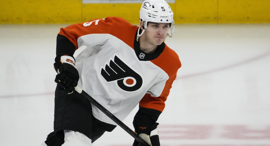 Mar 23, 2025; Chicago, Illinois, USA; Philadelphia Flyers defenseman Egor Zamula (5) warms up before a game against the Chicago Blackhawks at United Center.