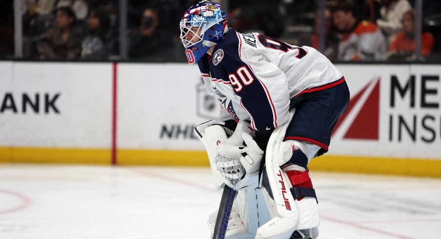 Dec 20, 2025; Anaheim, California, USA; Columbus Blue Jackets goaltender Elvis Merzlikins (90) looks on during the second period against the Anaheim Ducks at Honda Center.