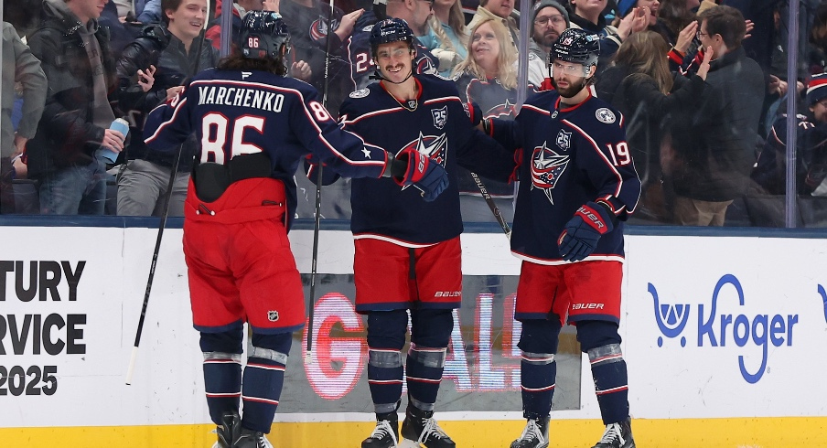 Jan 24, 2026; Columbus, Ohio, USA; Columbus Blue Jackets left wing Mason Marchment (17) celebrates his third goal of the game with right wing Kirill Marchenko (86) and center Adam Fantilli (19) during the third period against the Tampa Bay Lightning at Nationwide Arena.